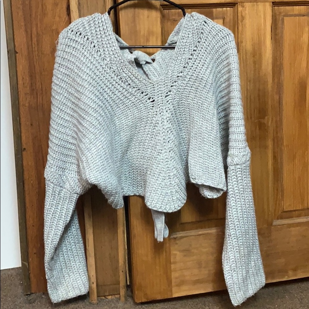 back tie gray cropped sweater with scalloped hem
